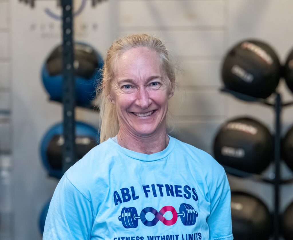 Medical fitness coach providing individualized support and exercise instruction
