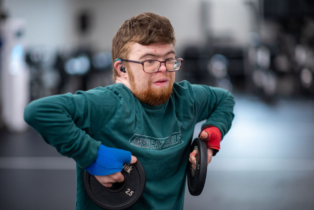 Athlete participating in inclusive powerlifting training at ABL Fitness